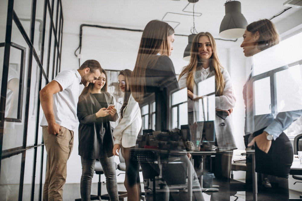 Group of people working out business plan in office